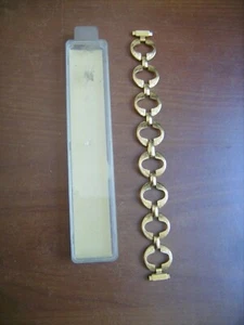 Bracelet de montre femme en métal doré larg 13 mm longueur 16,8 cm neuf emballé - Picture 1 of 2