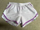 Under Armour Fly-By-2.0 ladies sports fitness shorts in white/purple - XS size