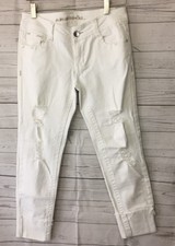 Almost Famous Womens capri jeans size 5 White ripped style folded cuffs fringe