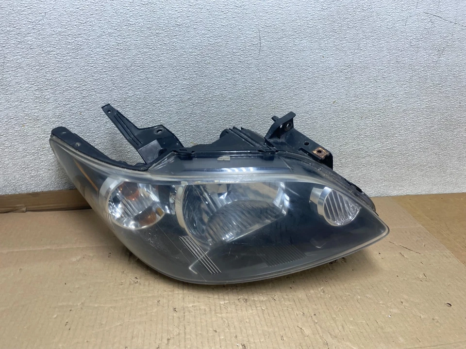 2004 至 2005 年马自达 Mpv 黑色边框右乘客右手车头灯 Oem U2937 DW — 第 1/4 张图片