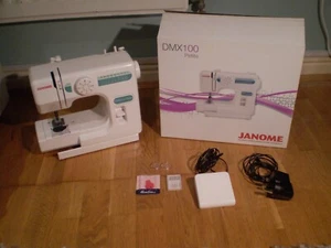 Janome DMX100 Sewing Machine - Picture 1 of 3