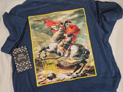 Camiseta Rebel Vengeance Bonaparte Gráfica Esqueleto Napoleón Cruzando Alpes Azul Foto 1 de 4