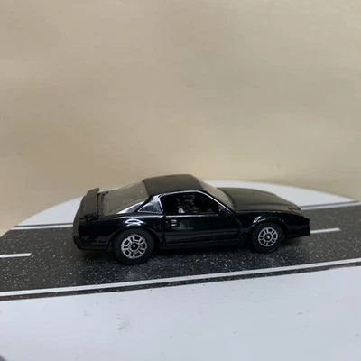 1982 Corgi Juniors Pontiac Firebird Trans-Am S/E Coupe Black 1:64 Scale  - Image 1 of 4