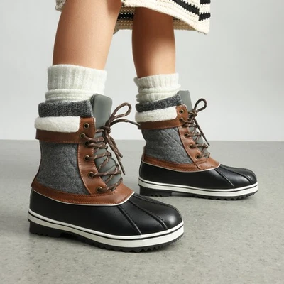 Botas de nieve impermeables para mujer cálidas forradas de piel sintética a media pantorrilla botas de invierno Foto 1 de 4