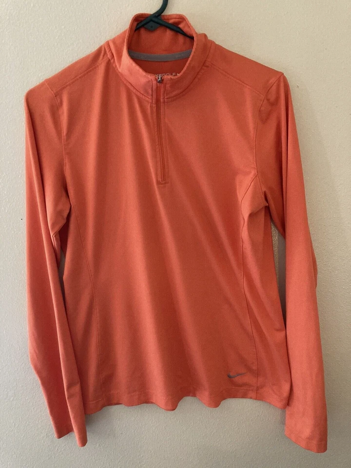 Pullover de golf Nike para mujer naranja mediano Dri Fit Tour Performance 1/4 cremallera logotipo Foto 1 de 4