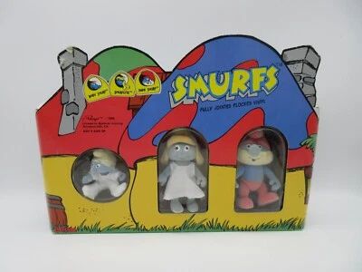 Juego de Pitufos Flocados Completamente Articulados De Colección Papá Bebé Pitufina ¡NUEVO EN CAJA! [Bikin, 1988] Foto 1 de 4