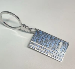 Christian Dior Schlüsselanhänger No.1 Trotter schräg blau silberfarben Länge 9 cm ohne Box - Bild 1 von 5