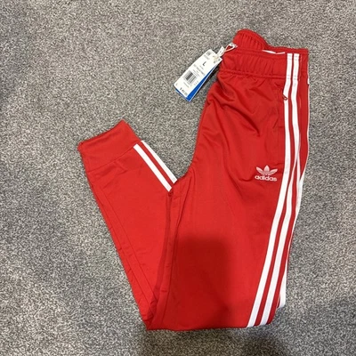 Pantalones deportivos talla L grandes ADIDAS ORIGINALESS niños SST rojos Foto 1 de 2