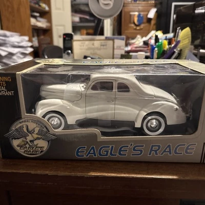 Eagle’s Race 1940 White Ford Deluxe Hard Top 1:18 Scale By Universal Hobbies - Image 1 of 4