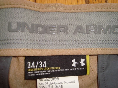 UNDER ARMOUR LOOSE KHAKI COLOR GOLF MESH PANTS SIZE 34 X 34 BNWOT! - Image 1 of 4
