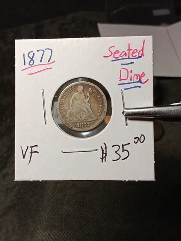 1877  SEATED LIBERTY DIME -VF  M/136 Cover