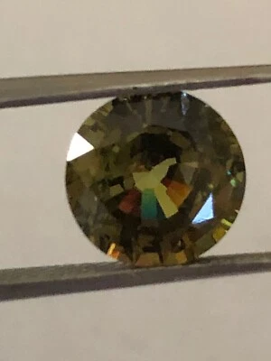 3.27 Ct. DEMANTOID GARNET WITH POSSIBLE HORSETAIL, TGL CERTIFIED - Image 1 of 4