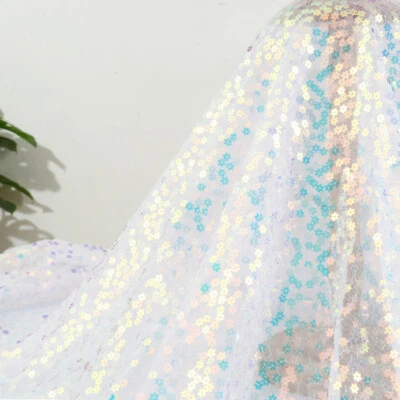 Tela de lentejuelas en forma de flor floral brillante brillante vestido de costura de fondo Foto 1 de 4