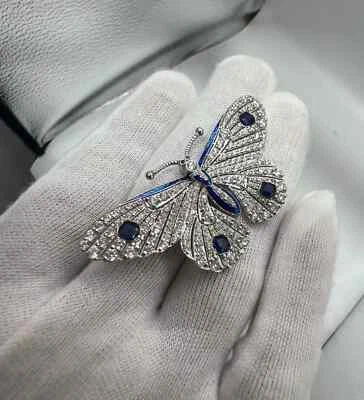 Broche broche mariposa zafiro creado en laboratorio corte redondo de 2,40 quilates chapado en oro blanco de 14 quilates Foto 1 de 4