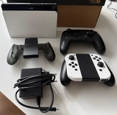 Nintendo Switch OLED Konsole + Joy-Con Controller + Pro Controller + Ladestation - Bild 1 von 4