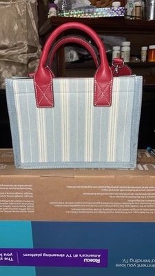 True Religion, Mini Tote Brand New Blue Canvas W/red Logo.Comes W/Shoulder Strap - Image 1 of 4