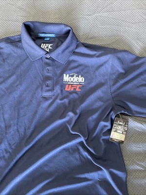Polo de golf Modelo Beer UFC mediano azul ropa con licencia oficial nueva con etiqueta Foto 1 de 4