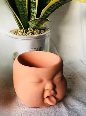 Übertopf Blumentopf Baby Kopf Beton Steinfigur Skulptur Zunge Deko Steinguss rot - Bild 1 von 2