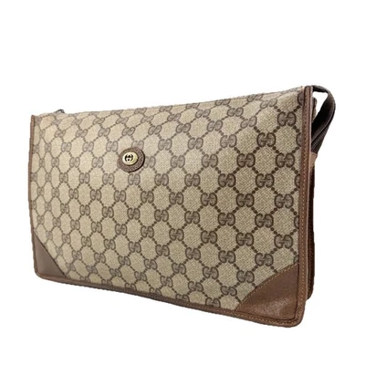 Auténtico bolso clutch vintage Gucci entrelazado GG Supreme marrón PVC cuero Foto 1 de 4