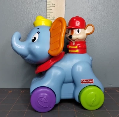 Fisher Price 2012 Dumbo Timothy Mouse Rollin Tunes juguete para bebé Disney Works Foto 1 de 4