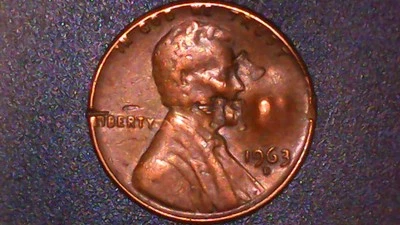 1963-D 1C Lincoln Cent Error. Struck thru error, Capped Die Clash error 3.2g - Image 1 of 4