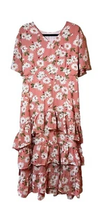 Vestidos florales rosa falda con volantes. - Imagen 1 de 3