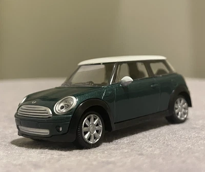 Modellino Norev Mini Cooper 3 inches 1/64 Metallo Verde Car Nuova Senza Scatola - Immagine 1 di 4