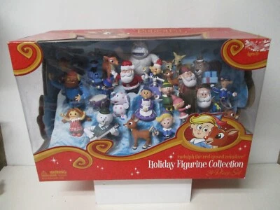 Juego de 24 estatuillas navideñas de Rudolph el reno nariz roja 2008 en caja original Foto 1 de 4