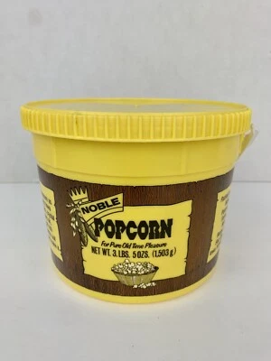 Anuncio de palomitas de maíz amarillo mango de cubo y tapa saco ciudad Iowa palomitas granjas Foto 1 de 4