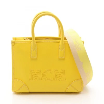 Bolso de Mano MCM Munich Bolso de Hombro Cuero Amarillo Usado Mujer Logo Foto 1 de 4