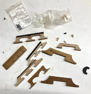 vintage banjo &uke parts lot Snuffy Smith bridge , 8 bone pips, uke bridge ,etc - Picture 1 of 6