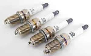 Four (4) Genuine Briggs & Stratton Spark Plug 491055T (Same as 491055, RC12YC) - Picture 1 of 3