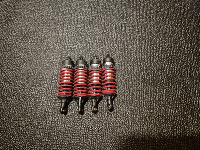 JUEGO COMPLETO CUERPO CHOQUE ROSCADO ALUMINIO TRAXXAS REVO JATO SUMMIT Foto 1 de 2