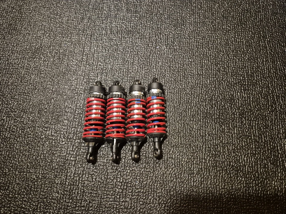 JUEGO COMPLETO CUERPO CHOQUE ROSCADO ALUMINIO TRAXXAS REVO JATO SUMMIT Foto 1 de 2