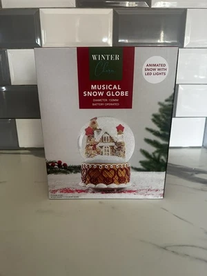 Winter Charm Large Gingerbread Family Musical Snowglobe Animated Snow LED Lights - Image 1 of 4