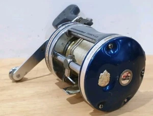 ABU Ambassadeur 7000C4LD Mulinello da Pesca Esca Blu Leva Trascinatore,Moltiplicatore. - Foto 1 di 10
