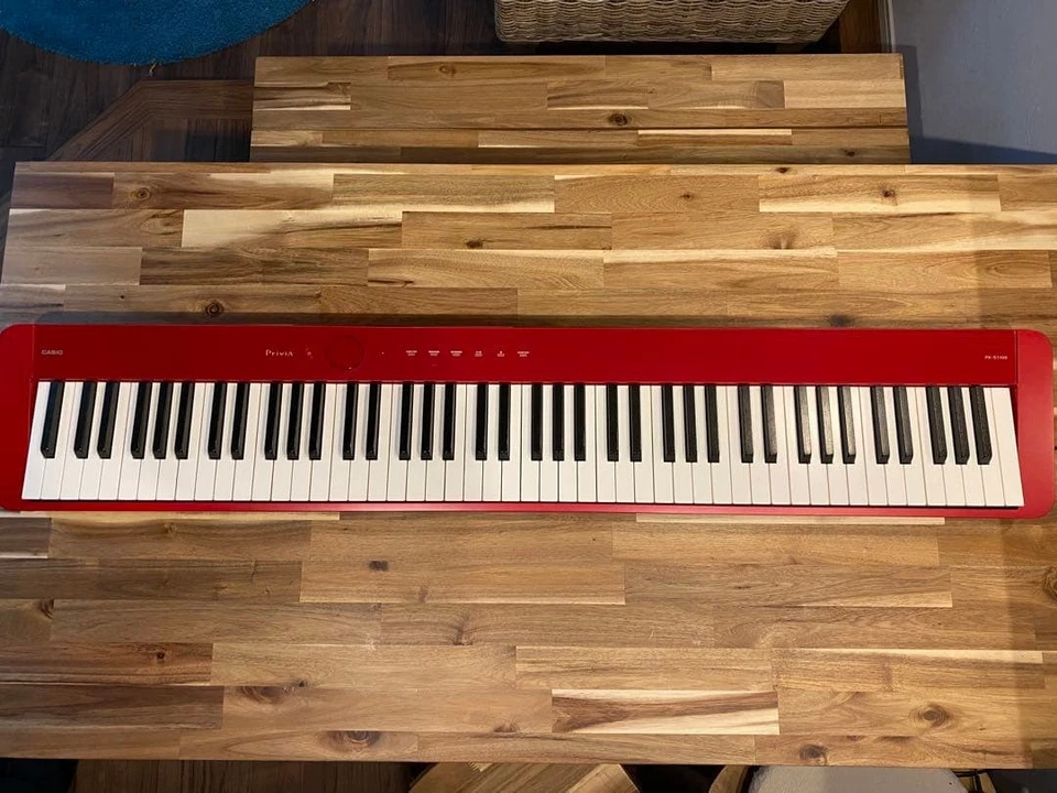 Casio Privia PX-S1100RD Red 88-Key Digital Piano with Pedal, Case & Sheet Music - Image 1 of 4