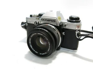 Cámara SLR Olympus OM-10 35 mm película excelente estado con lente Zuiko 50 mm 1:1,8 - Imagen 1 de 10