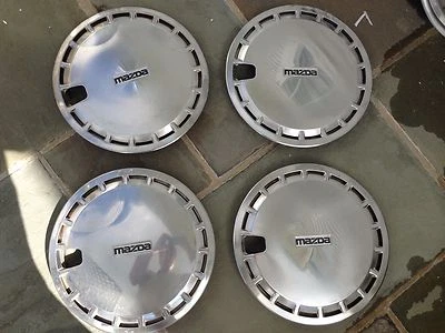 '83 84 85 86 Mazda GLC 13" tapacubos cubierta de rueda OEM  Foto 1 de 2