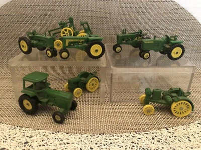 Miniature John Deere Cast Iron/ Plastic Toy Tractors & Farm Equipment 8 Pc. Lot - Image 1 of 4