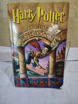 Harry Potter and the Sorcerer's Stone by J. K. Rowling Paperback LG Prit (BOO210 - Image 1 of 4