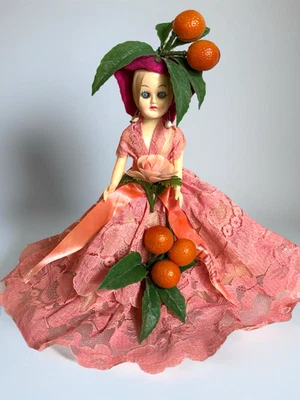 Vestido de renda vintage Florida Souvenir boneca laranja pêssego 8” de altura - Imagem 1 de 4