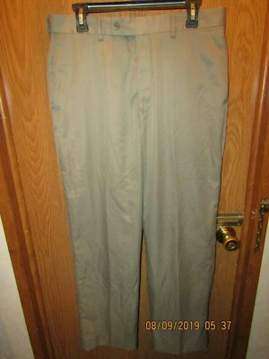 PANTALONES DELANTEROS PLANOS CAQUI 100 % POLIÉSTER CINTURA ELÁSTICA ALFORJA HOMBRE TALLA 34X30 Foto 1 de 4