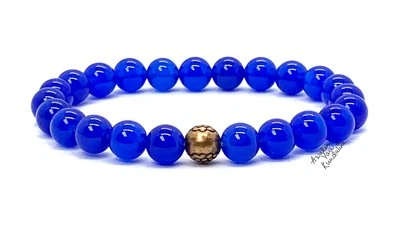 Pulsera elástica de jade azul de 8 mm con cuentas centrales de cobre - piedra de nacimiento de marzo Foto 1 de 4