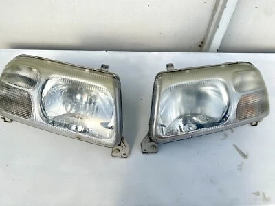 Par de faróis Suzuki Grand Vitara 1999-05 LH RH - Imagem 1 de 4