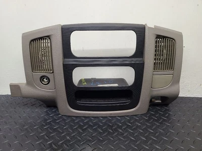 03-05 Dodge Ram 2500 Center Dash Bezel Tan Black OEM 5GV52WL5AB - Image 1 of 4