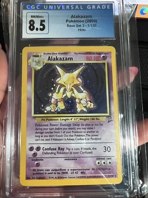 WOTC Graded Pokemon 2000 Base Set 2 Unlimited Holo Alakazam #1/130 CGC 8.5 NM/M+ - Image 1 of 4