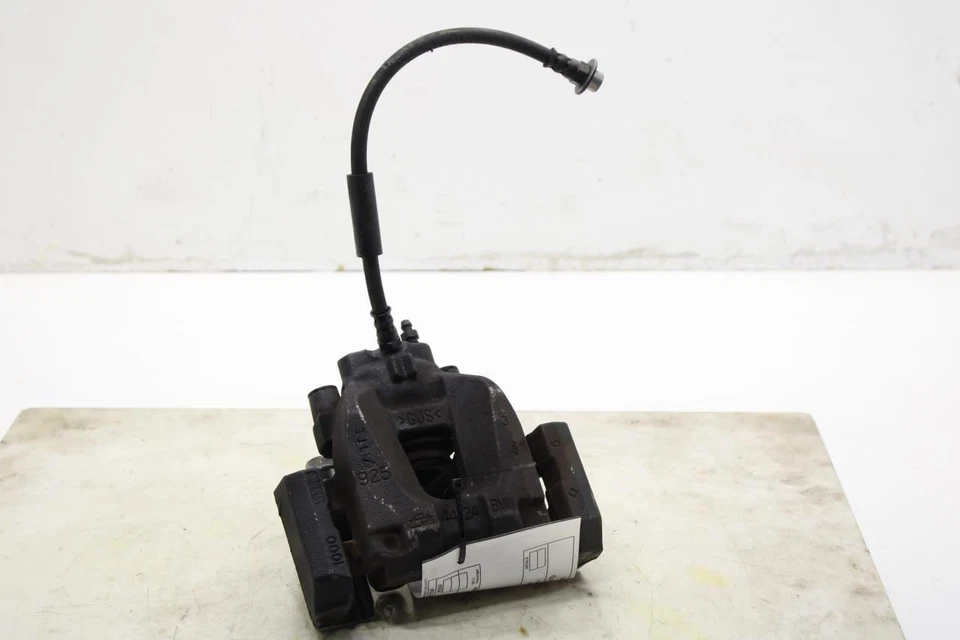 Pinza de disco de freno trasera derecha pasajero BMW 750I xDrive 2010-15 34216786832 Foto 1 de 4