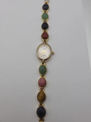 Reloj de cuarzo ovalado pulsera escarabajo dorado de vestir Gruen Precision para mujer funcionando Foto 1 de 4