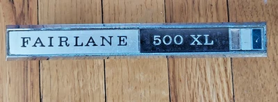 1966 1967 FORD FAIRLANE DOOR PANEL XL EMBLEM - Image 1 of 4